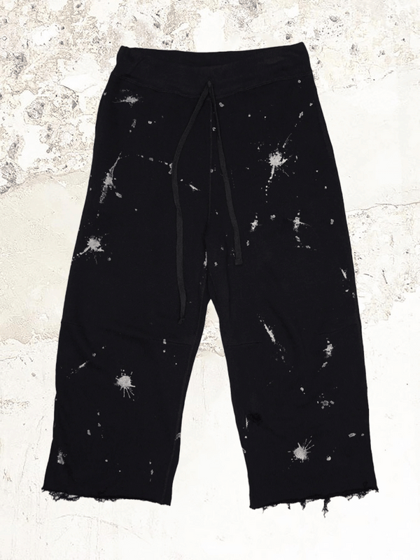 R13 distressed track trousers