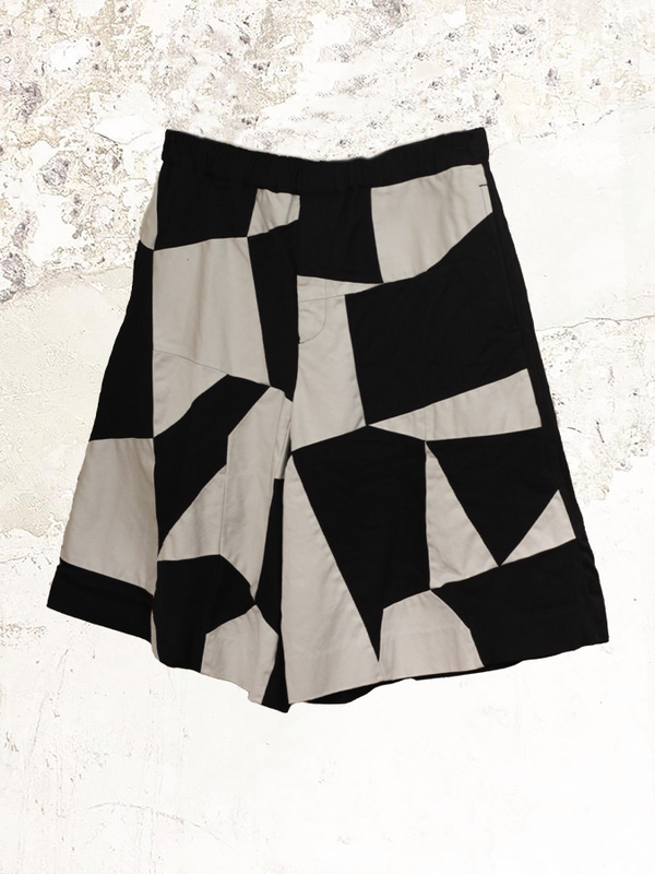 Black Comme des Garçons Gabardine patchwork shorts