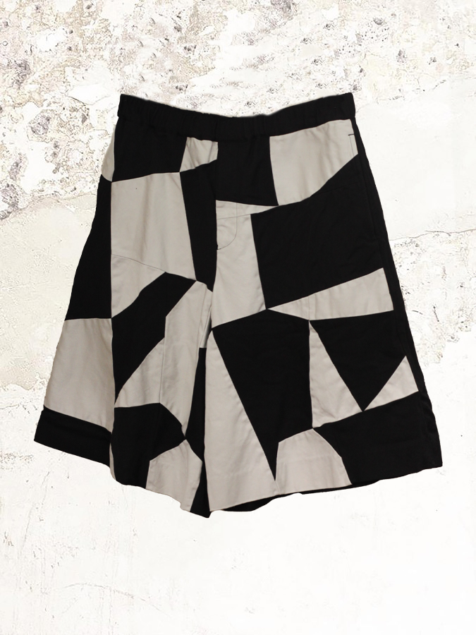 Black Comme des Garçons Gabardine patchwork shorts